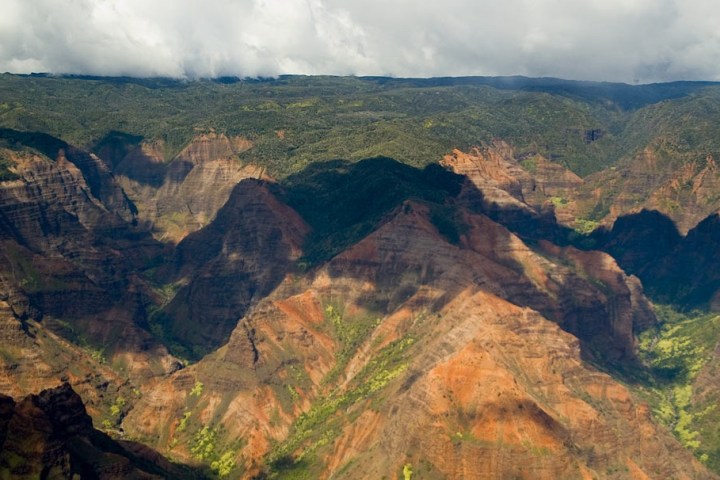 a canyon with Waimea Canyon State Park in the background